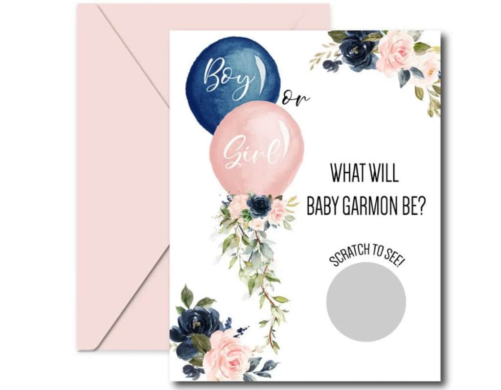 Baby gender reveal scratch-off cards with a pink envelope. The card has a white background with a blue and pink balloons and flowers. It features the Text 